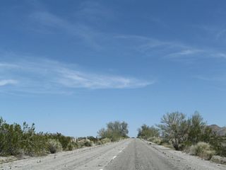 The sixth seasonal wash bridge along Pinto Road is a short distance beyond the fifth crossing.