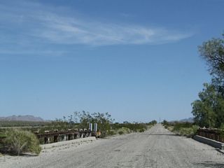 Getting closer to parallel Interstate 10, Pinto Road crosses a seventh wash bridge.