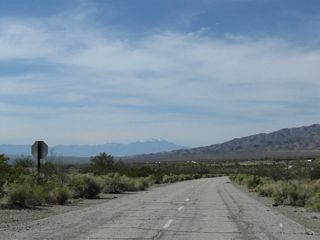 Pinto Road west where Box Canyon Road, the original alignment of U.S. 60/70, branches west to Cottonwood Springs Road.