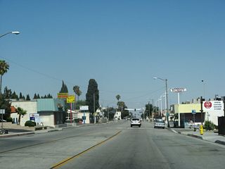 Advancing east through Downtown Banning, eastbound Historic U.S. 60-70-99 (Ramsey Street) passes by the historic Fox Theatre.