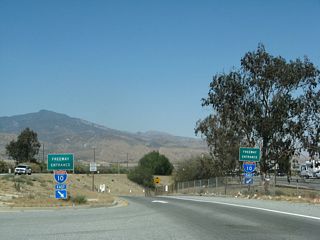 The old alignment of U.S. 60-70-99 concludes at a wye interchange joining Ramsey Street with Interstate 10 east.