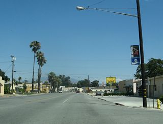 Prior to construction of I-10 as a freeway bypass, Sixth Street was the major corridor across Beaumont. This once-busy highway now functions as n unofficial business route. Here eastbound Sixth Street (old U.S. 60-70-99) meets Wellwood Avenue.