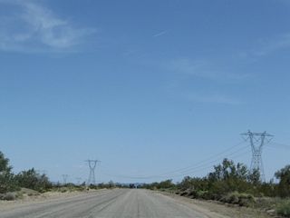 Power lines spanning old U.S. 60-70 are the Devers-Palo Verde 500kV lines that connect a nuclear power plant in Arizona with a substation near Palm Springs. It is owned and operated by Southern California Edison.