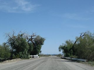 Old U.S. 60-70 crosses a second seasonal wash east of Corn Springs Road. The old bridge retains wooden railing.