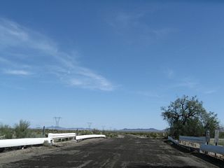 Chuckwalla Road spans an eighth wash ahead of the eastern turn back toward Interstate 10.