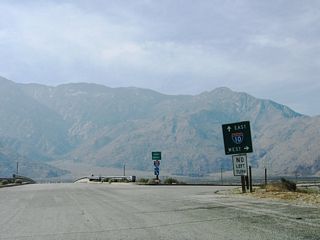 A parclo interchange joins Whitewater Cutff Road to the north and Tipton Road to the southwest with Interstate 10 at Exit 114.