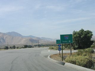 Whitewater Cutoff Road transitions directly onto Tipton Road, which carries former U.S. 60-70-99 along the south side of Interstate 10. Tipton Road connects with SR 111 (Palm Canyon Drive) 2.4 miles south of the exchange with I-10.