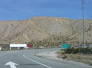 Interstate 10 proceeds east across the Whitewater River from Whitewater Cutoff Road and next meets SR 62 (29 Palms Highway).