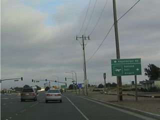 The Hegenberger Road Expressway is a major arterial route from the airport northeast to Interstate 880/NImitz Freeway, then onward to a Bay Area Rapid Transit (BART) Station before heading east past California 185/International Avenue. The expressway changes into 73rd Avenue and enters Eastmont. 73rd Avenue changes into Edwards Avenue before reaching Interstate 580 near its junction with California 13.