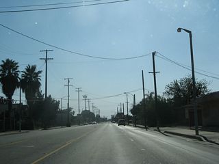 California 66 (Fifth Street) carries five lanes west of the Interstate 215 bridge. The state route continues west from this point to California 210 Exit 47 in the city of La Verne. Historic U.S. 66 follows the route of California 66, then continues west on Foothill Boulevard as it parallels Interstate 210 toward Pasadena.