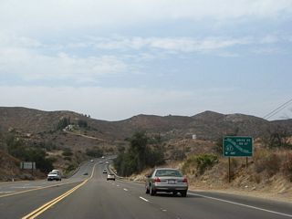 Another California 67 safety corridor sign is posted after Scripps-Poway Parkway. Designated a safety corridor by Caltrans, California 67 has frequent collisions, some of them head-on, as a result of the frequent curves, heavy traffic, and high speeds. Some of the additional traffic may be attributed to the new backcountry Indian casinos that have been added to the landscape since the late 1990s.