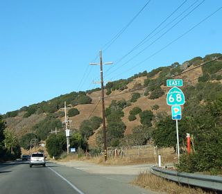 This eastbound California 68 shield is located east of the intersection with Monterey County G-20 near Corral de Tierra. Note that this is an official scenic route.