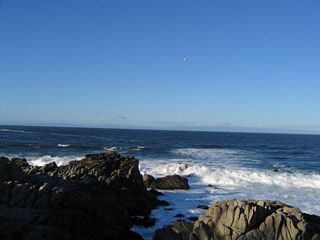 Although California 68 does not actually come into view of the ocean or Monterey Bay, views such as these are afforded from various locations along Ocean View Boulevard from the Monterey city limits northwest to Point Pinos, a distance of a couple miles. Ocean View Boulevard is easily reached by following Asilomar Avenue north from the terminus of California 68 at Lighthouse Avenue. A walking/biking path parallels the waterfront.