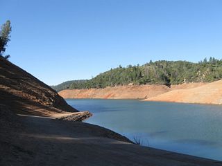 Dark Canyon Road, which extends from the shore of Lake Oroville northeast to Big Bend Road, is part of the original alignment of the Feather River Highway, which opened as California 24 on August 14, 1937. (California 24 was renumbered as U.S. 40 Alternate in 1954, and U.S. 40 Alternate was replaced with California 70 on July 1, 1964).