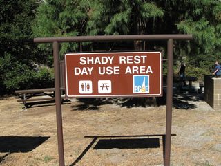 Located just west of the Butte-Pulga County Line, the Shady Rest Day Use Area has an outhouse and picnic tables for motorists passing through the Feather River Canyon. The rest area is sponsored partially by Pacific Gas & Electric, which has a presence in the canyon to generate electricity from hydroelectric turbines located at various diversion dams along the route of the river. Some interpretive panels are located at this rest area, including a few for the tunnels east of here along California 70.