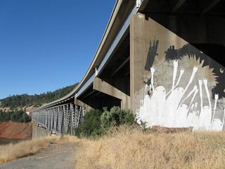 The West Branch Bridge was built between November 1959 and completed in February 1962, with the approaches to the bridge completed and opened to traffic in August 1962.⁷⁸