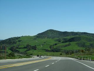 Traveling south of unincorporated Ladera Ranch in Orange County, Antonio Parkway advances to SR 74 (Ortega Highway).