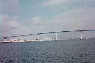 The San Diego-Coronado Bay Bridge, which connects the city of Coronado with San Diego, arcs over the San Diego Bay.  Five lanes wide, the bridge has reversible lanes that are adjusted to accommodate rush hour traffic.