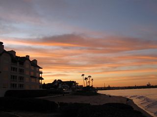 Looking northwest from the same vantage point, aircraft carriers stationed at North Island Naval Air Station along San Diego Bay are visible.