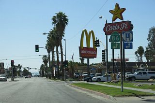 Two blocks west, westbound former California 78 meets California 86 (First Street) in Brawley. Turn left here for California 86 (First Street) south to Imperial and El Centro. Ahead, former California 78 and California 86 proceed in unison northwest toward Westmorland, Indio (via California 86 north), and Julian (via California 78 west).