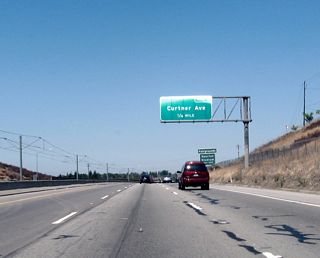 Use Exit 3, Curtner Avenue to San Jose State University's Spartan Stadium. From California 87, the stadium is found via Curtner Avenue east to California 82 (Monterey Highway) north to Alma Street east. Use Curtner Avenue east to the Santa Clara County Route Fairgrounds and Stonegate Park along Coyote Creek.