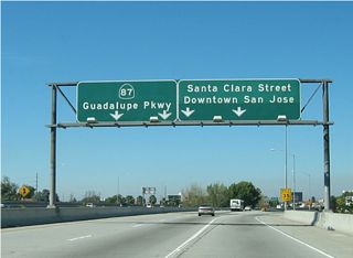 Now on the collector distributor lanes, the first ramp connects to San Carlos Street (California 82) and Auzerais Street. The second ramp, shown here, offers the connection to Santa Clara Street, and the third ramp connects to Julian Street. Photo taken by Pete Sison (05/24/03).