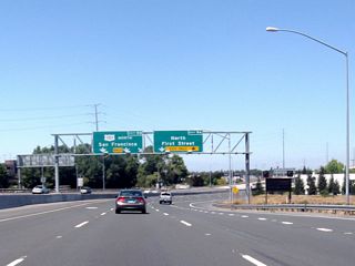 California 87 prepares to end as the right lanes connect to Exit 9A, North First Street and the left lanes connect to Exit 9B, U.S. 101 (Bayshore Freeway) north.