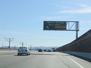 California 87 south expands with a dedicated lane for Exit 1 D to unsigned Santa Clara County Route G-21 (Capitol Expressway) and Auto Mall.