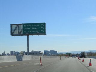 Another mileage sign provides the distance to the next three exits along California 87 (Guadalupe Parkway) south: Exit 7, Taylor Street; Exit 6B, Julian Street; and Exit 6A, Park Avenue and California 82 (West San Carlos Street). In this area, California 87 passes Interstate 880, but there are no connectors between the two freeways.