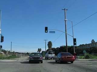 Eastbound California 90/Marina Expressway meets Mindanao Way at this traffic signal.