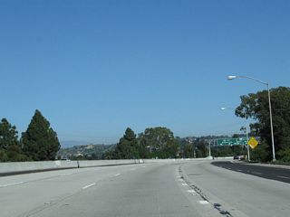 Two new lanes join California 90 east from Centinela Avenue.