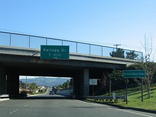 Leaving the intersection with Yorba Linda Boulevard, eastbound California 90 (Imperial Highway) next approaches Kellogg Drive, the only full interchange along the Richard M. Nixon Parkway. The parkway extends from Yorba Linda Boulevard southeast to Esperanza Road and Orangethorpe Avenue. This overhead sign is mounted on the Lakeview Avenue overpass.