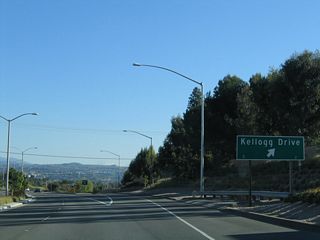 Eastbound California 90 (Imperial Highway / Richard M. Nixon Parkway) meets Kellogg Drive at this off-ramp.