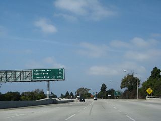 Leaving the Interstate 405 interchange, this mileage sign provides the distance to the final two exits along California 90 (Marina Freeway) west as well as the western terminus of the state highway: Exit 1D, Centinela Avenue; Exit 1C, Culver Boulevard; and Exit 1A, California 1 (Lincoln Boulevard) (traffic signal/end of expressway). Omitted from the list is a signalized intersection with Mindanao Way (Exit 1B) between Culver Boulevard and Lincoln Boulevard.