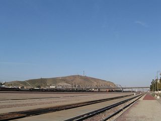 These views of the U.S. 91 Old Iron Bridge over the rail yard are taken from the grounds of the Harvey House.