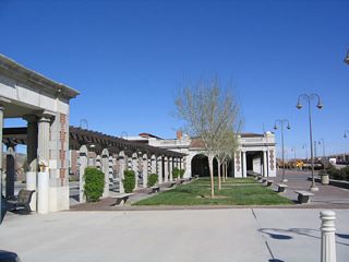 View of the promenade on the south end of the Harvey House, looking north. The rail yard is to the right, while U.S. 91 is located to the left.