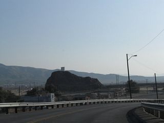Beyond the truss section of the Old Iron Bridge, old U.S. 91 turned northeast toward the Harvey House and old railroad depot. The Mojave River Bridge comes into view in the distance.