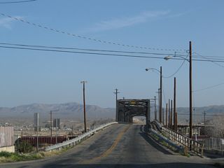 Heading north out of central Barstow, U.S. 91 formerly crosses the BNSF Rail yard across the Old Iron Bridge.