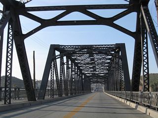 2023-24 construction replaced the Old Iron Bridge with a modern span to the west. The former bridge along Historic U.S. 91 was subsequently demolished.