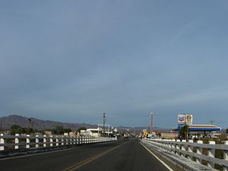Part of the business route from I-15 through Baker, an old bridge carries Historic U.S. 91-466 (Baker Boulevard) northeast over the Mojave River, a seemingly dry river that links with Soda Dry Lake to the south.