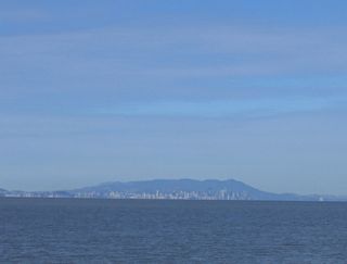 From the San Mateo-Hayward Bridge, westbound travelers can look north on a clear day and see the downtown skylines of both San Francisco and Oakland.