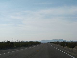 Generally following Sacramento Wash to the north, U.S. 95 diverges from the BNSF Railroad, which continues north to Ibus.