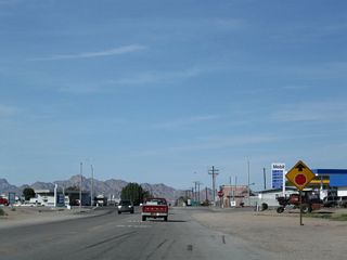 Beyond I-10, U.S. 95 (Intake Boulevard) meets Business Loop I-10 (Hobson Way) at an unmarked intersection.