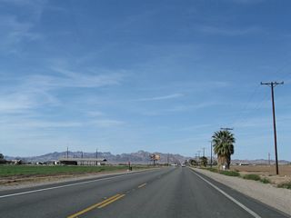 Leaving Blythe, the two-lane highway proceeds through fertile farmland along the west bank of the Colorado River in the Palo Verde Valley.
