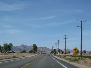 Northbound U.S. 95 (Intake Boulevard) approaches 8th Avenue.