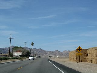 Northbound U.S. 95 (Intake Boulevard) meets 6th Avenue.