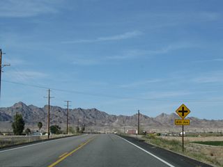 Northbound U.S. 95 (Intake Boulevard) approaches 4th Avenue, which also provides local and farm access east and west of the highway.