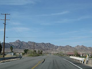 Near the 4th Avenue intersection is this bridge with white painted guardrail.