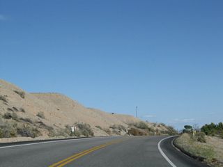 As the roadway turns closer to the water, U.S. 95 leaves the fertile areas surrounding Blythe and now approach the Palo Verde Dam.
