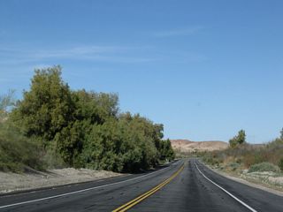 To the north and west of U.S. 95 are foothills and desert environment; to the east and south are the areas adjacent to the Colorado River.